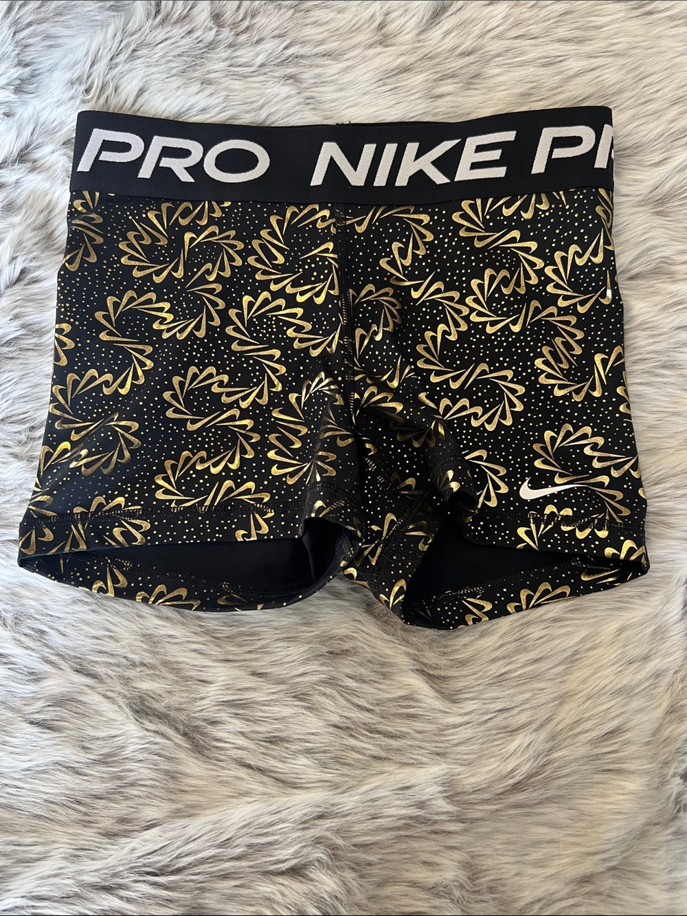 Nike Pro Women's Black and Gold Floral-Print Athletic Shorts